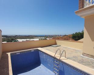 Piscina de Casa adosada en venda en Torrox amb Calefacció, Jardí privat i Terrassa