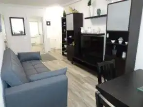 Sala de estar de Piso de alquiler en Gijón  con Calefacción, Parquet y Amueblado
