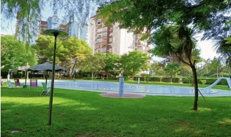 Piscina de Apartament de lloguer en La Pobla de Farnals amb Jardí privat