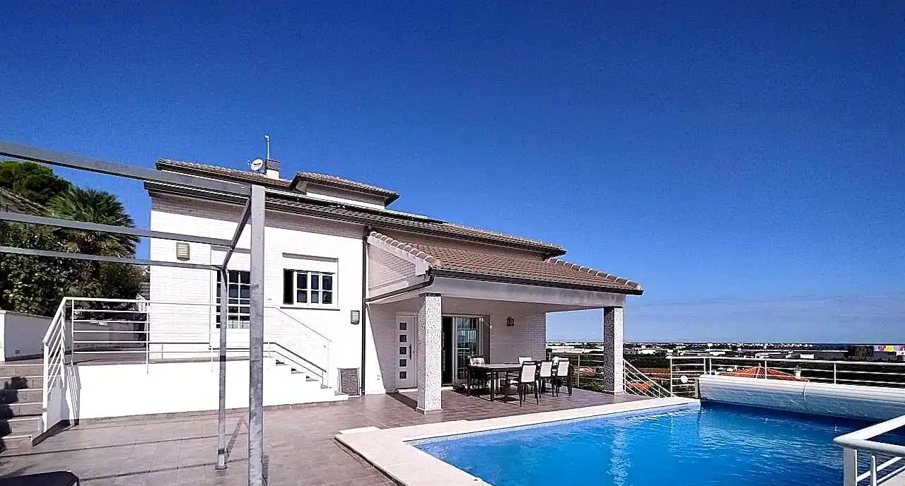 Piscina de Casa o chalet en venta en Oliva con Aire acondicionado, Jardín privado y Terraza