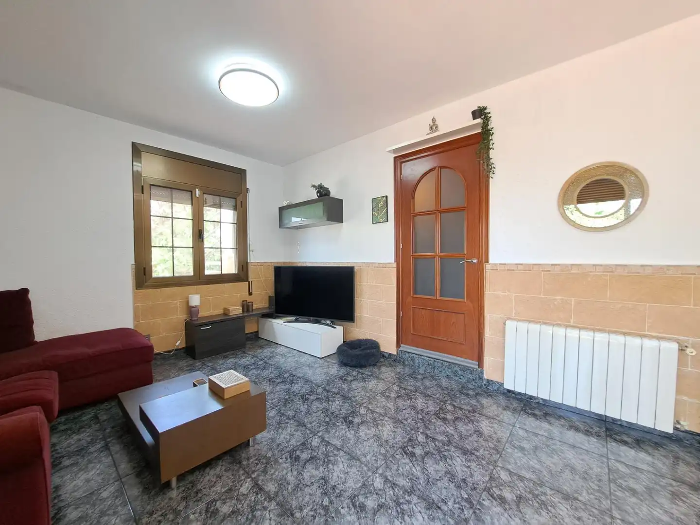 Sala d'estar de Casa o xalet en venda en Castellví de Rosanes amb Calefacció, Jardí privat i Terrassa
