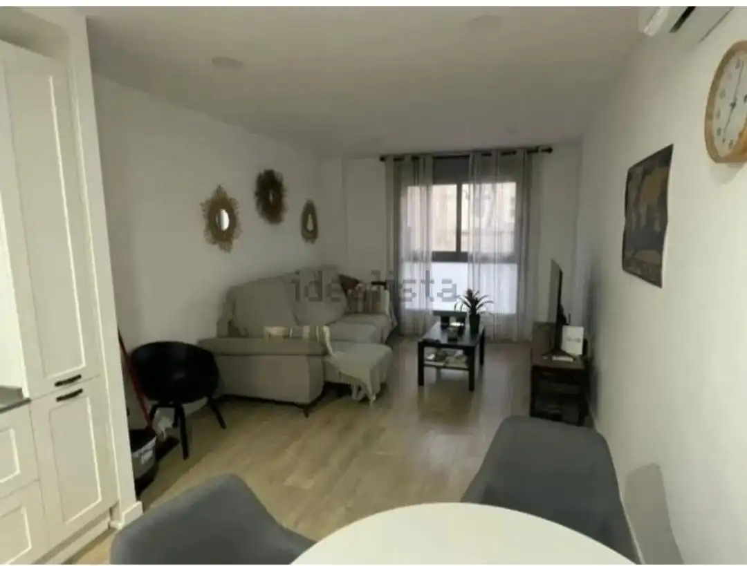Sala d'estar de Pis de lloguer en Almería amb Aire condicionat i Moblat
