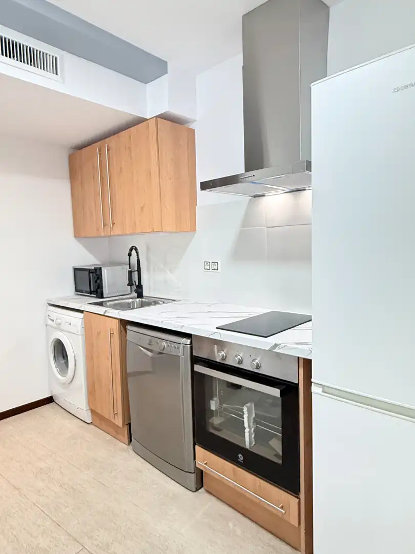 Cocina de Apartamento en venta en Santa Eulària des Riu con Aire acondicionado, Calefacción y Jardín privado