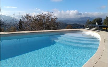 Swimming pool of House or chalet for sale in Sant Joan Les Fonts  with Air Conditioner and Swimming Pool