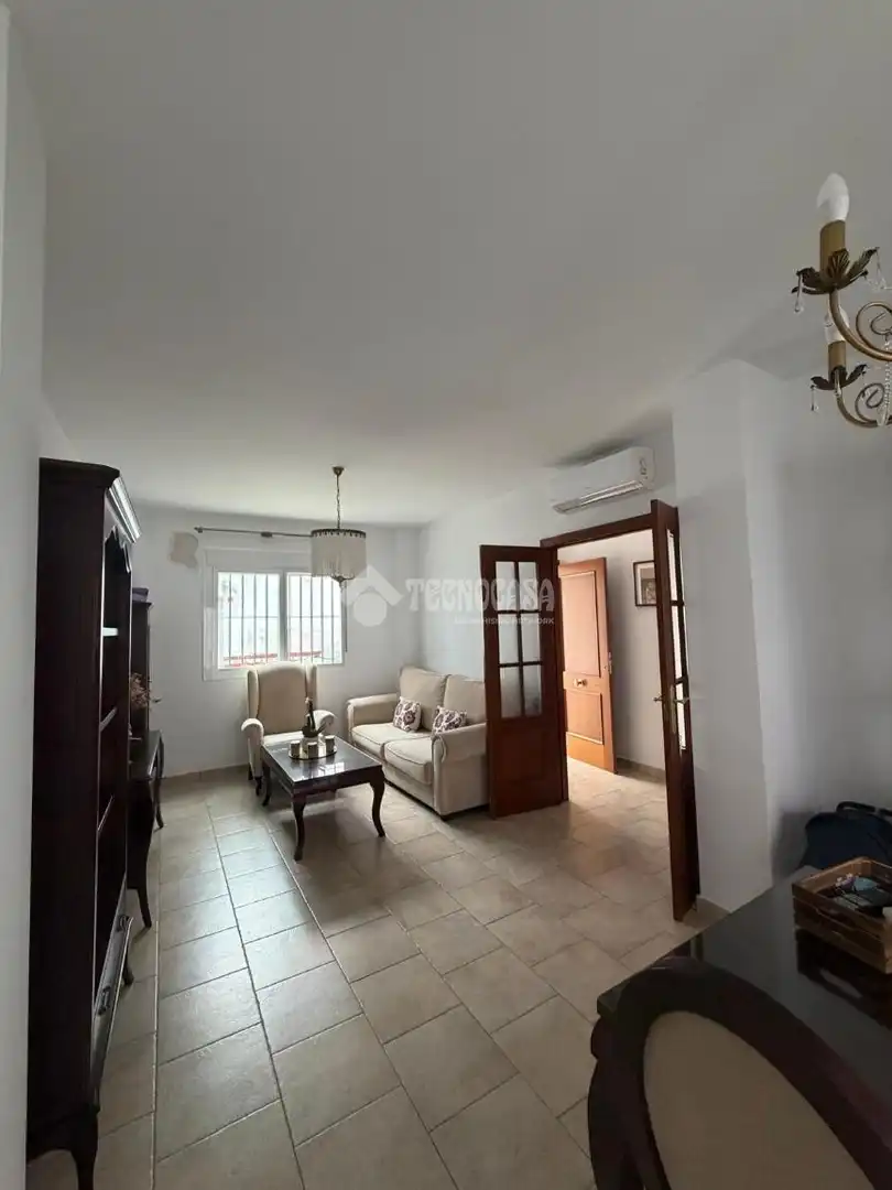 Sala de estar de Casa adosada en venta en Utrera con Aire acondicionado y Calefacción