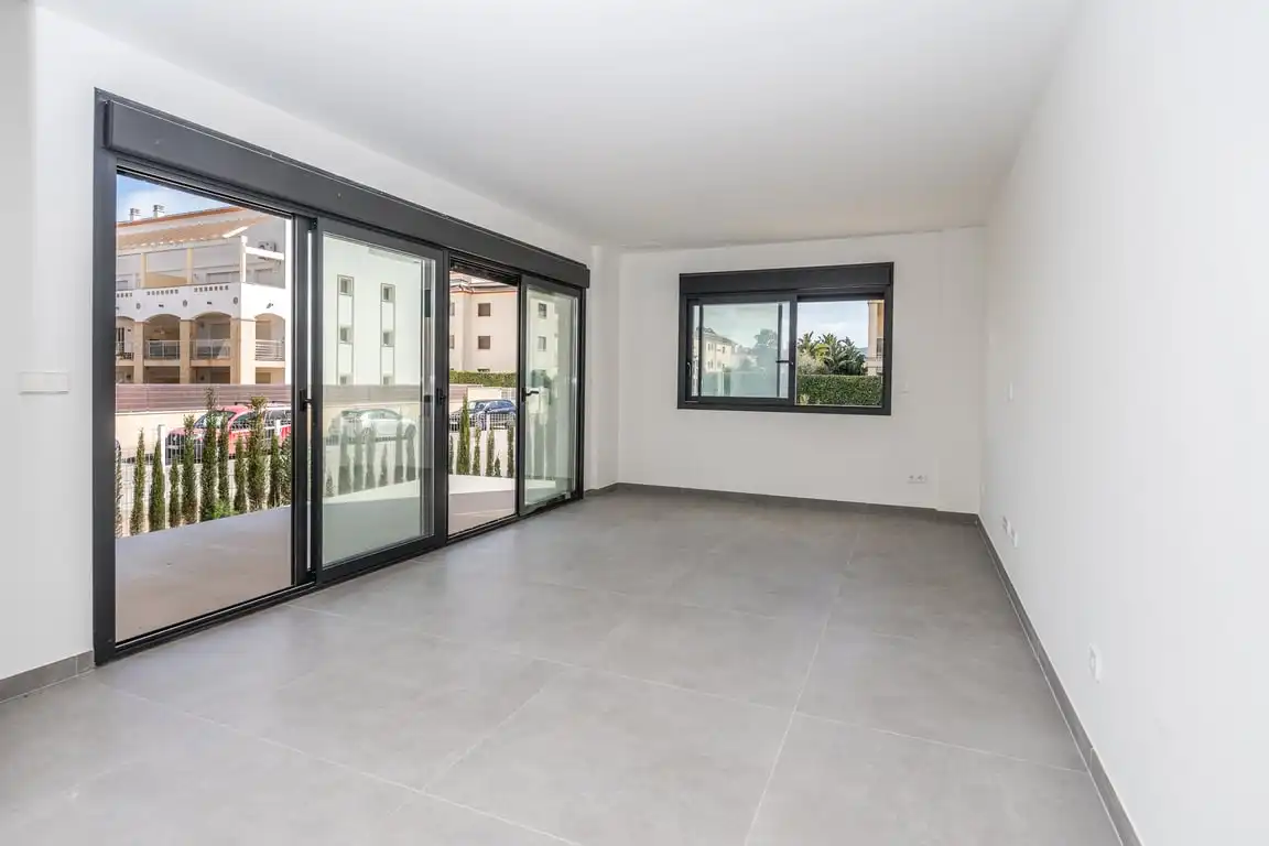 Living room of Flat for sale in Jávea / Xàbia  with Air Conditioner, Private garden and Storage room
