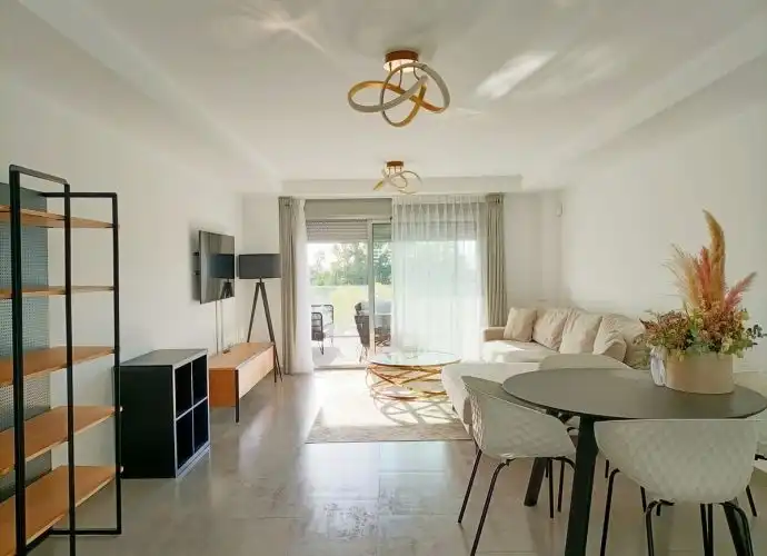 Living room of Flat for sale in Estepona  with Air Conditioner, Terrace and Storage room