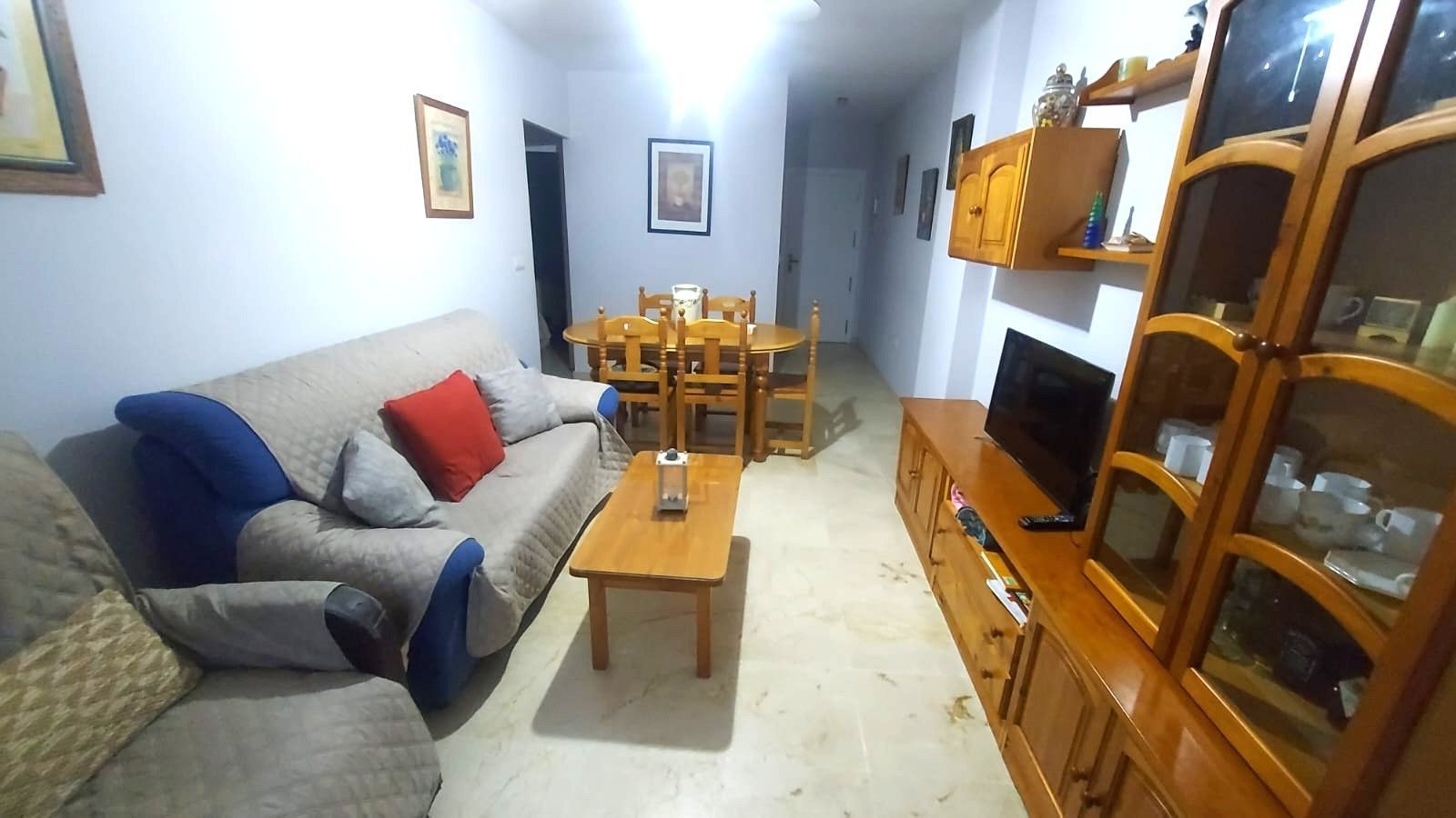 Sala d'estar de Apartament de lloguer en El Portil amb Moblat i Piscina comunitària