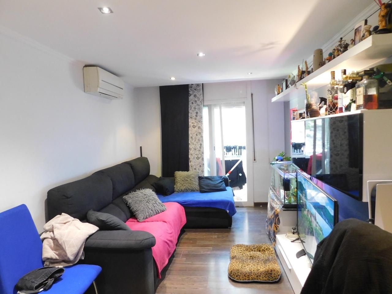 Living room of Flat for sale in Montgat  with Parquet flooring, Furnished and Balcony