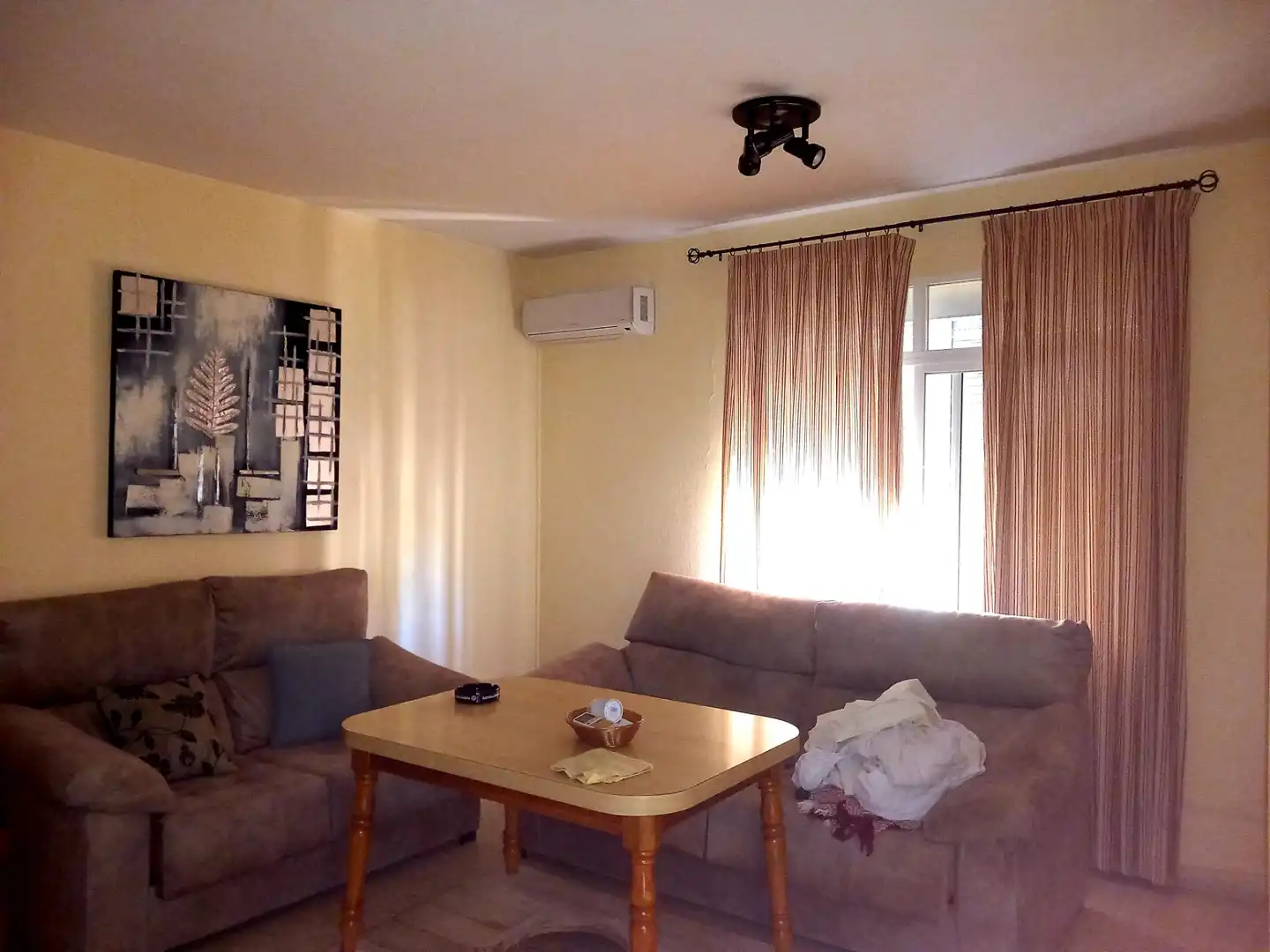 Sala d'estar de Casa adosada en venda en Talavera la Real amb Aire condicionat i Terrassa