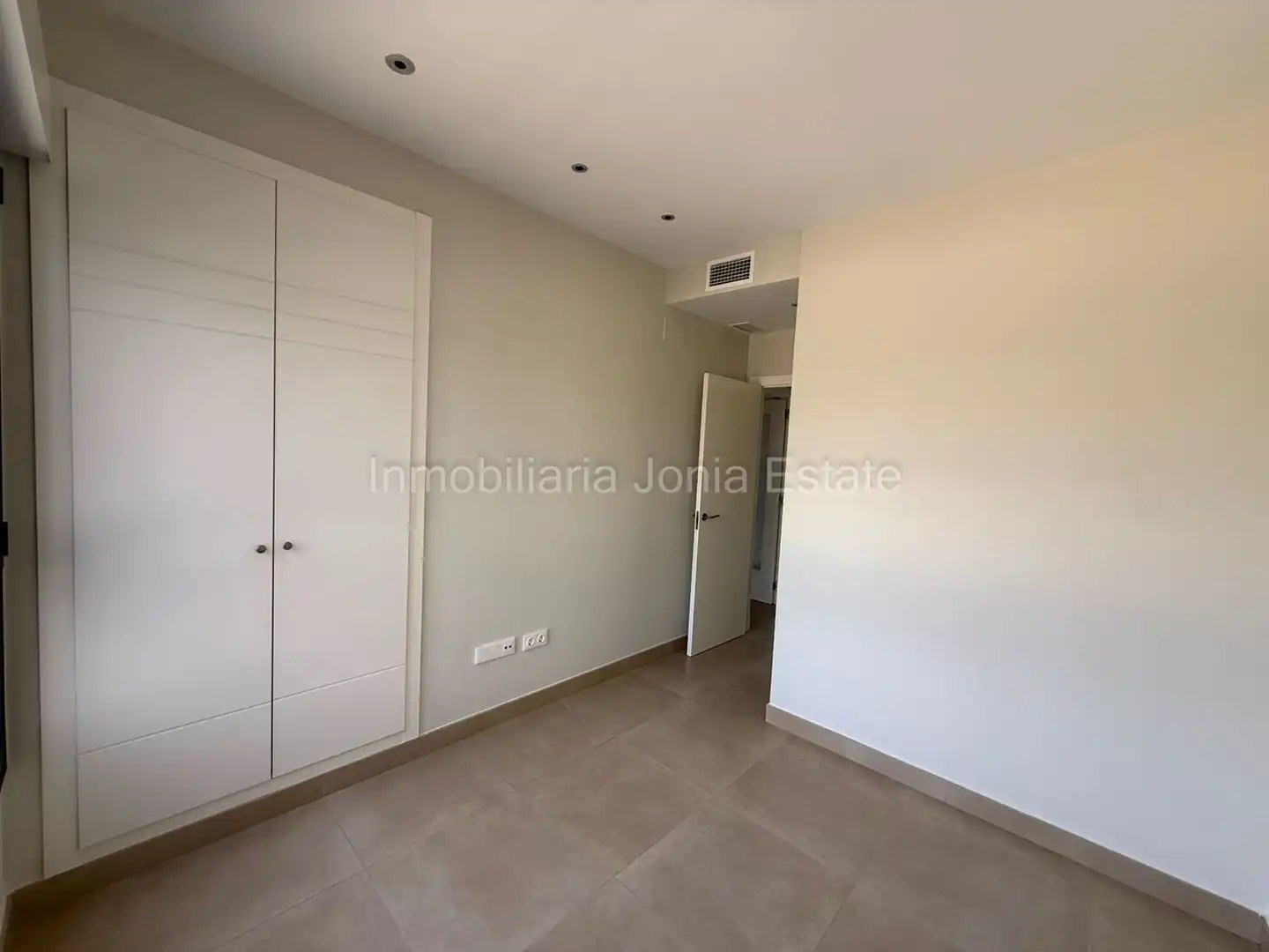 Dormitori de Apartament de lloguer en Villajoyosa / La Vila Joiosa amb Aire condicionat, Jardí privat i Terrassa