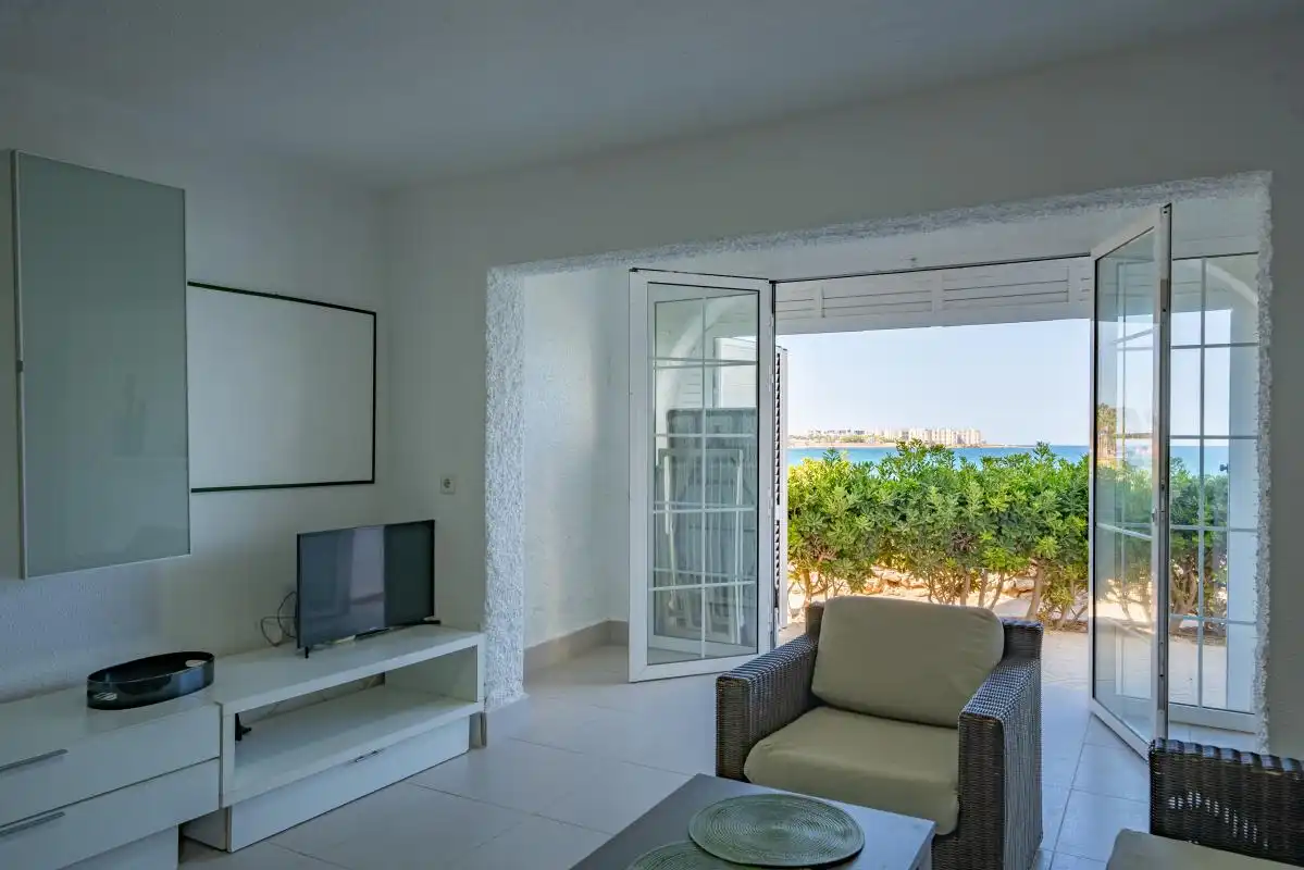 Sala de estar de Casa adosada en venta en Orihuela con Calefacción, Jardín privado y Piscina