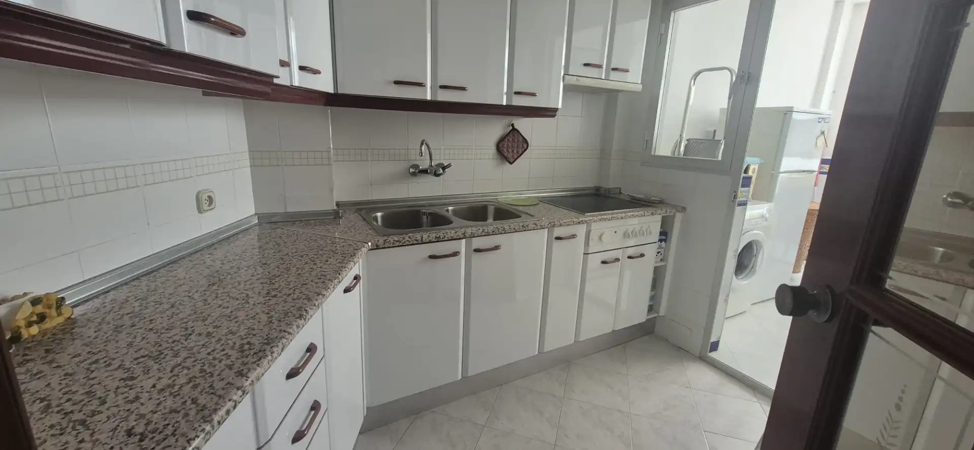 Cuina de Apartament en venda en El Portil amb Terrassa, Moblat i Piscina comunitària