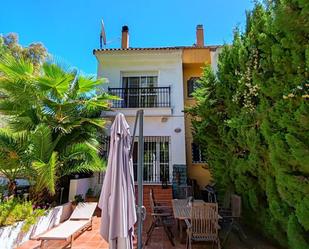 Jardí de Casa adosada en venda en Benalmádena amb Aire condicionat, Jardí privat i Parquet