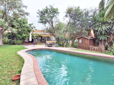 Casa rústica amb piscina en venda a Campanillas