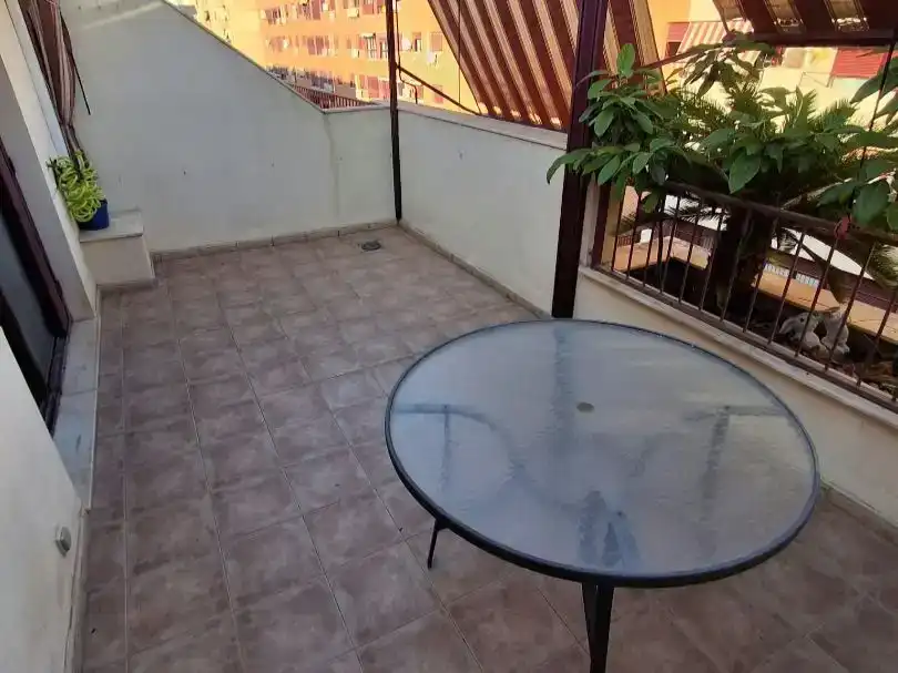 Terrassa de Casa adosada en venda en Sagunto / Sagunt amb Aire condicionat i Piscina