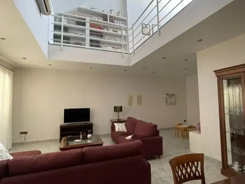 Sala d'estar de Casa adosada en venda en Gandesa amb Aire condicionat, Jardí privat i Traster