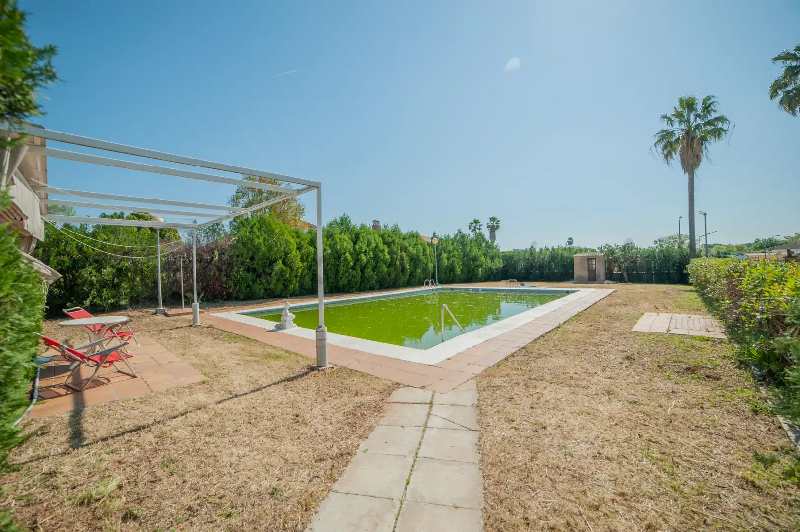 Piscina de Casa o xalet en venda en La Rinconada amb Aire condicionat, Jardí privat i Piscina