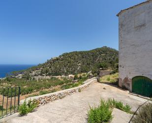 Vista exterior de Finca rústica en venda en Banyalbufar amb Aire condicionat, Terrassa i Piscina