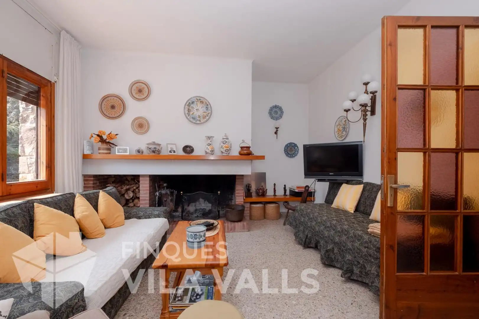 Sala d'estar de Casa o xalet en venda en Sant Quirze Safaja amb Jardí privat