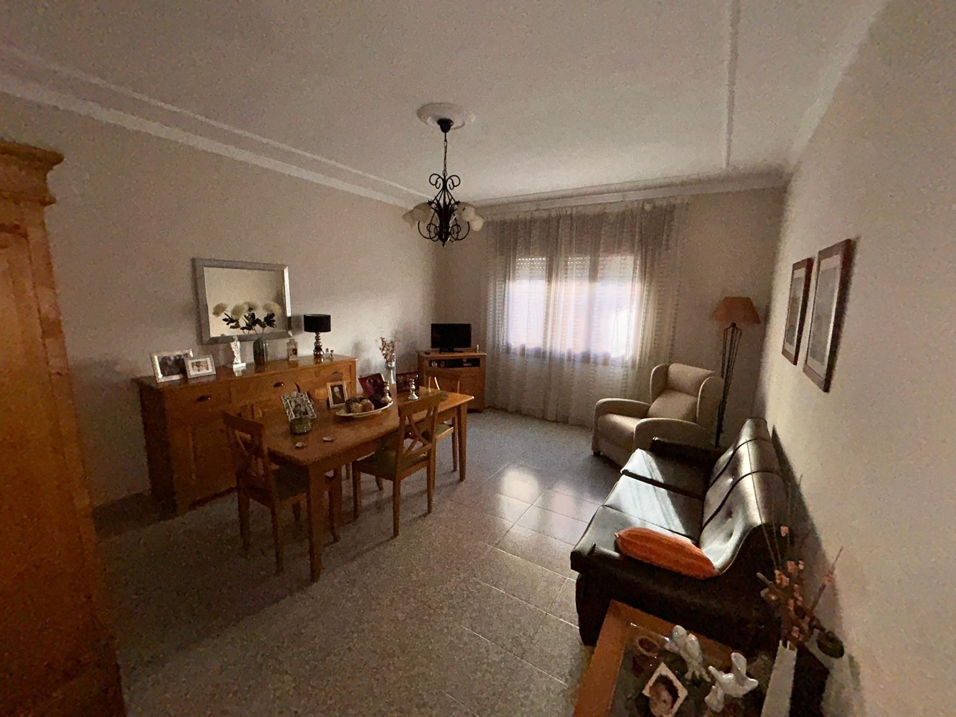 Sala d'estar de Casa adosada en venda en Roquetas de Mar