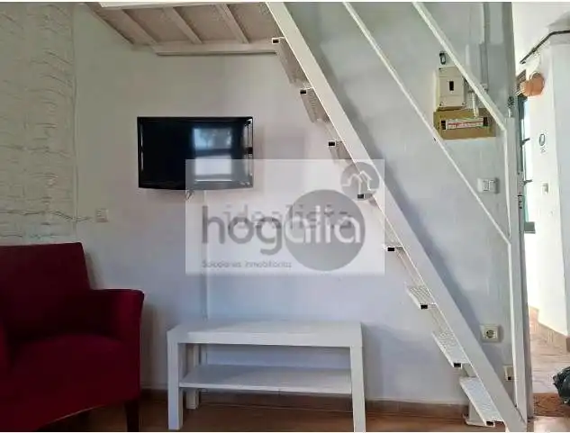 Sala de estar de Estudio de alquiler en Sevilla con Aire acondicionado, Terraza y Amueblado