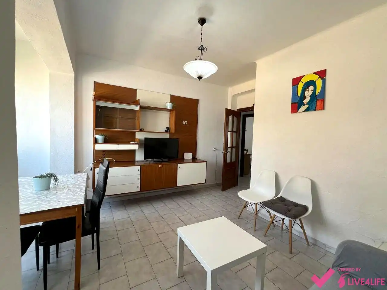 Sala de estar de Piso para compartir en Sevilla con Aire acondicionado, Calefacción y Amueblado