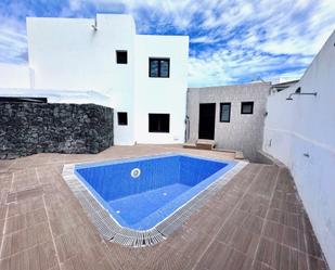 Swimming pool of Single-family semi-detached for sale in Teguise  with Swimming Pool and Balcony