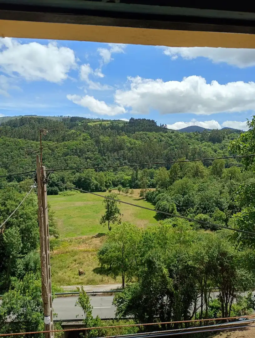 Casa adosada en venta en Pravia con Calefacción, Terraza y Trastero