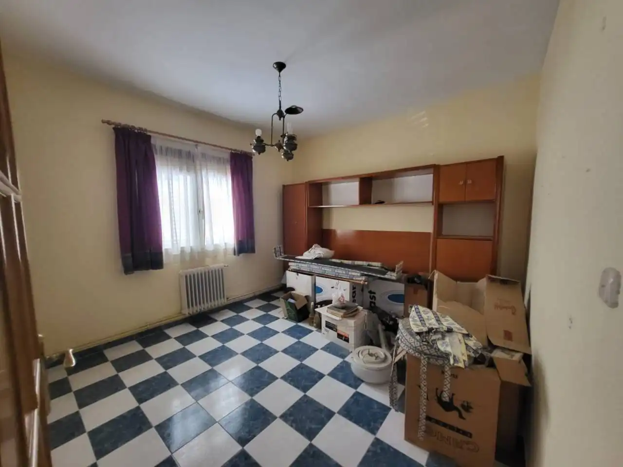 Sala d'estar de Casa o xalet en venda en Baza amb Calefacció i Terrassa