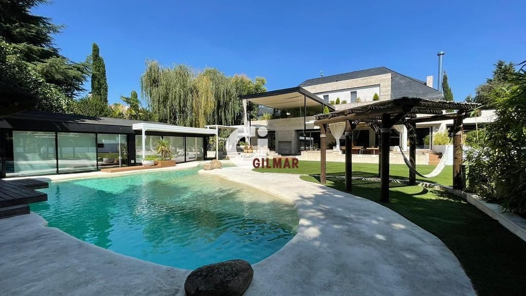 Swimming pool of House or chalet for sale in La Moraleja  with Air Conditioner, Heating and Private garden