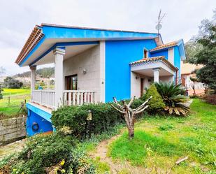Vista exterior de Casa o xalet en venda en Sanxenxo amb Calefacció, Jardí privat i Terrassa
