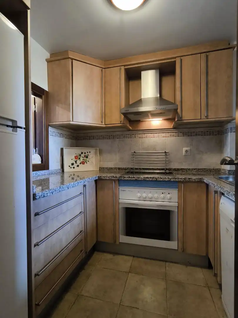 Cocina de Apartamento de alquiler en Ayamonte con Terraza, Amueblado y Piscina comunitaria