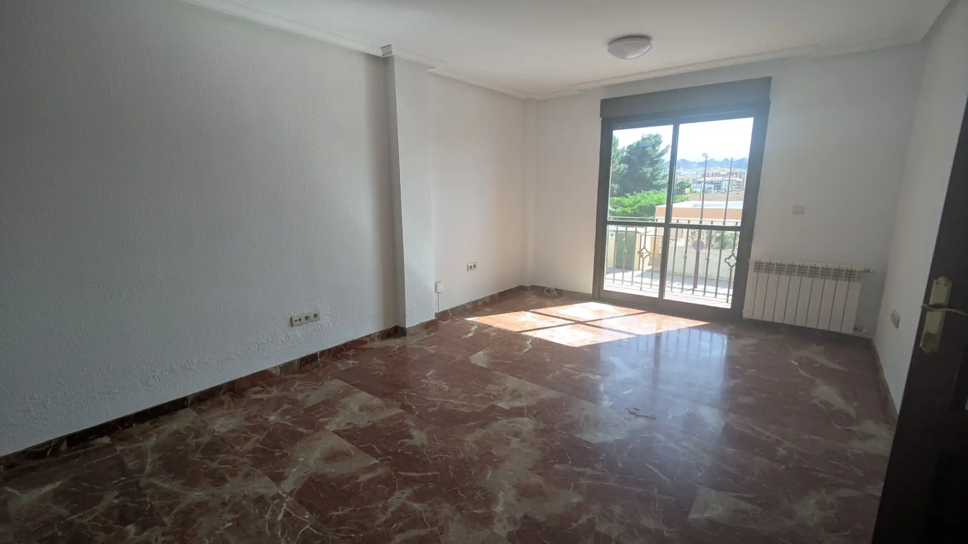 Sala de estar de Casa adosada en venta en Guadix con Calefacción