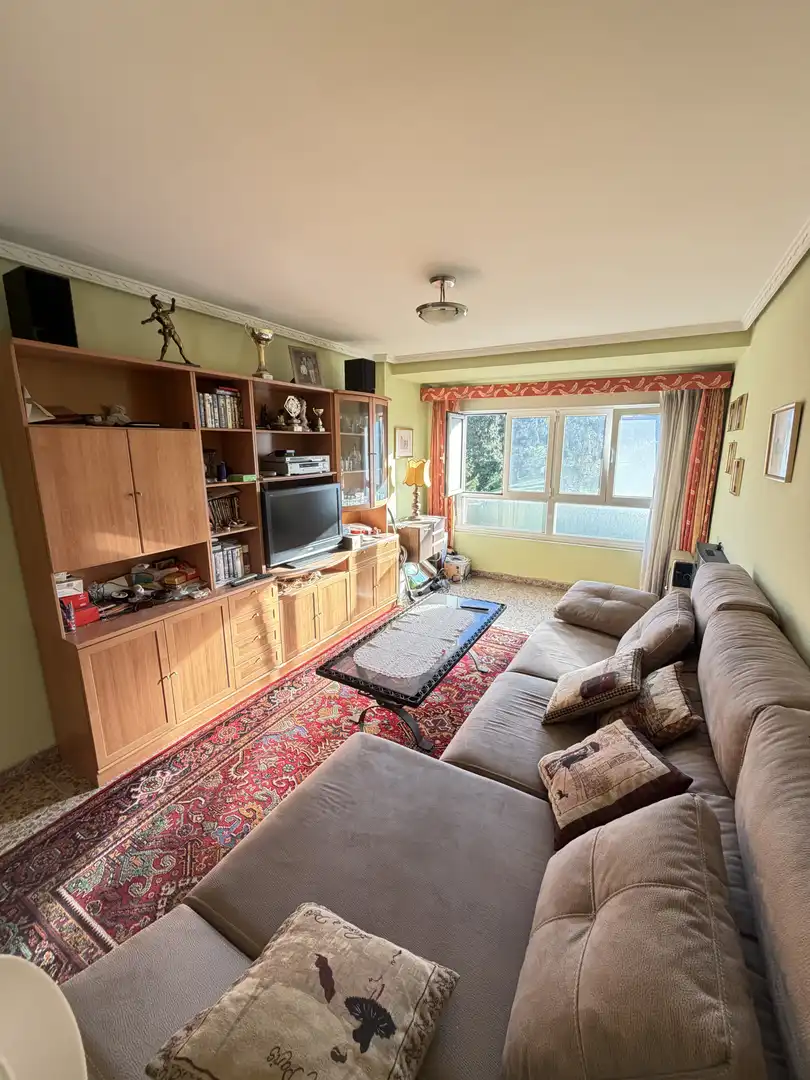Sala de estar de Piso en venta en Castrillón con Jardín privado, Trastero y Amueblado