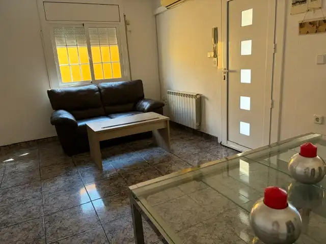 Sala de estar de Casa adosada en venta en Esparreguera con Calefacción, Terraza y Trastero