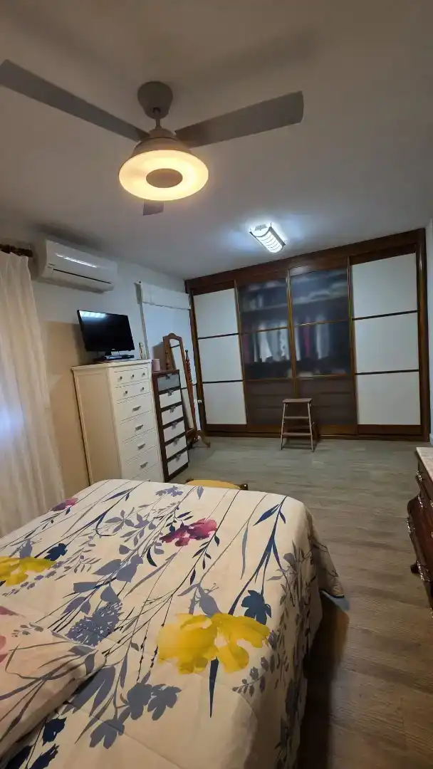 Dormitori de Casa adosada en venda en Mérida amb Aire condicionat