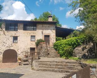 Vista exterior de Finca rústica en venda en Sant Joan Les Fonts amb Terrassa, Piscina i Moblat