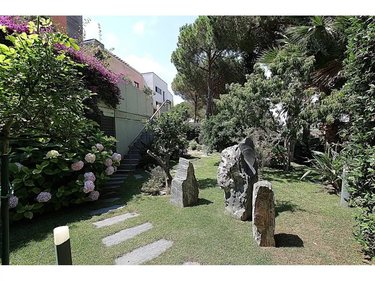 Garten von Wohnung zum Verkauf in Lloret de Mar mit Klimaanlage, Heizung und Privatgarten
