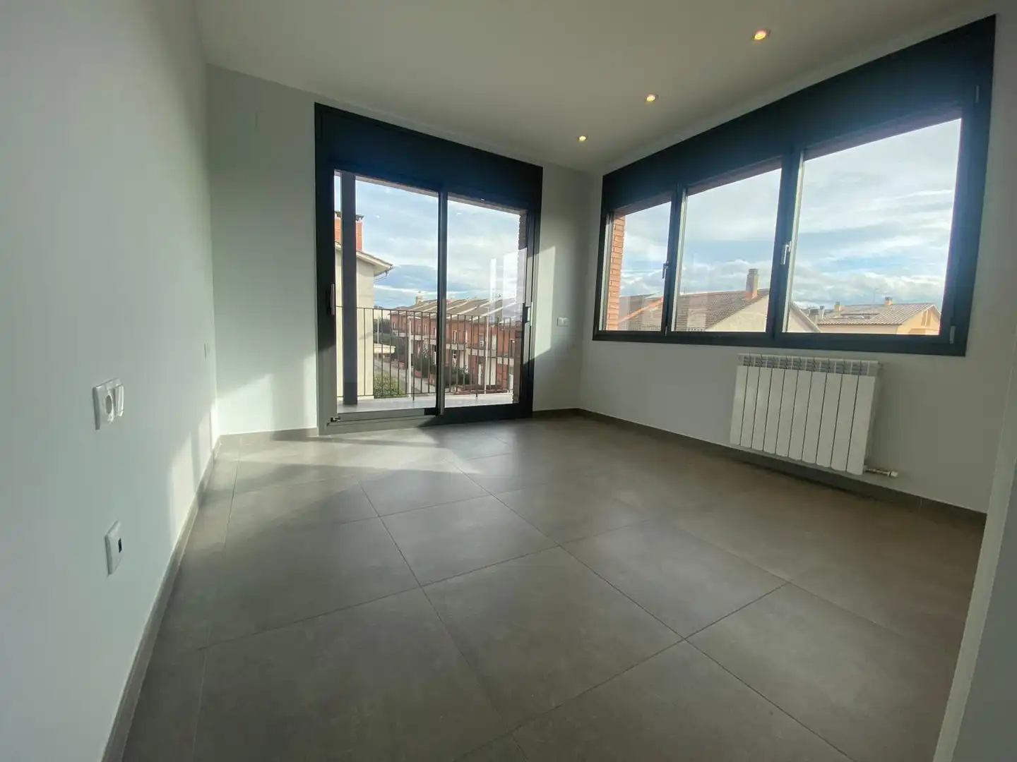 Sala de estar de Casa adosada en venta en Vic con Calefacción, Jardín privado y Terraza
