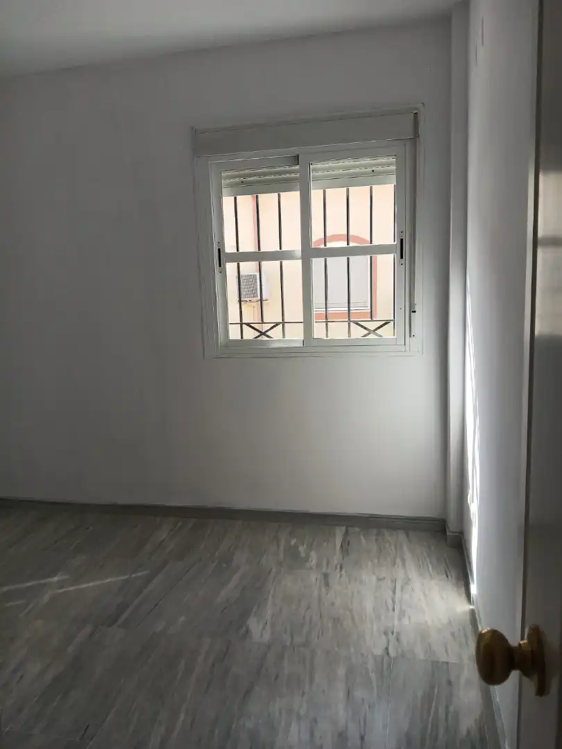 Habitación de Casa adosada de alquiler en Castilleja de la Cuesta con Aire acondicionado