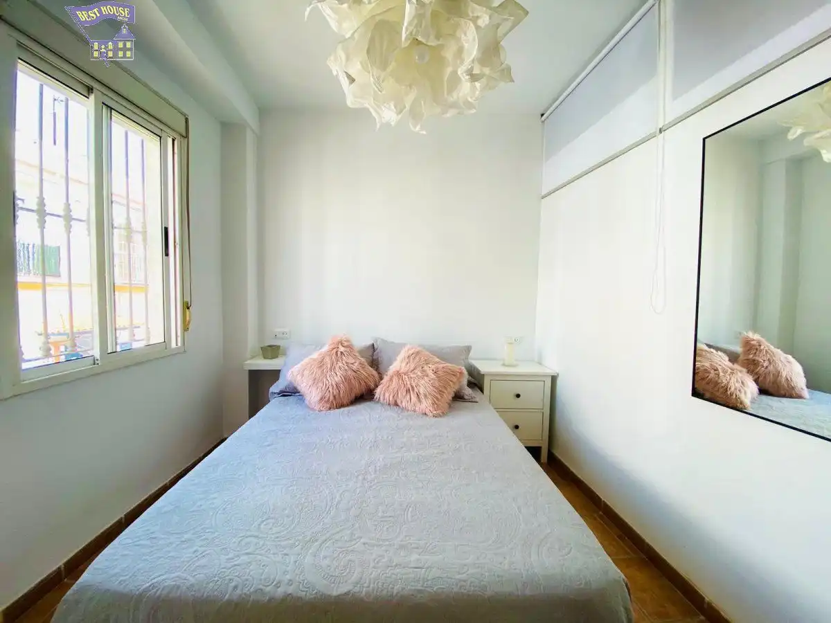 Dormitori de Apartament de lloguer en Arcos de la Frontera amb Aire condicionat, Terrassa i Moblat