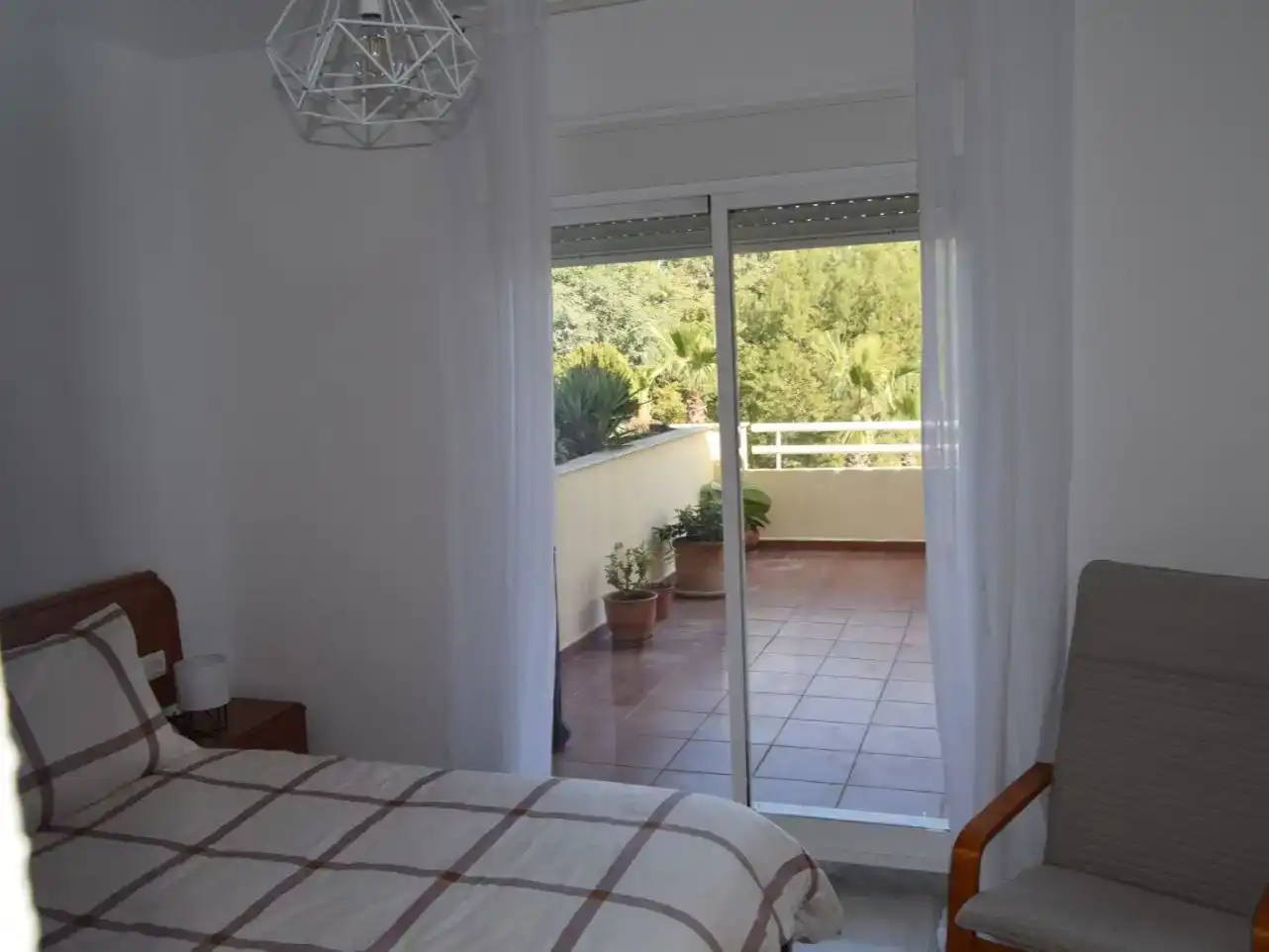 Schlafzimmer von Wohnung zur Miete in Benalmádena mit Klimaanlage und Schwimmbad