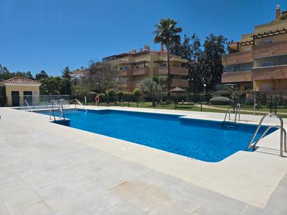 Swimming pool of Flat for sale in Mijas  with Air Conditioner, Heating and Terrace