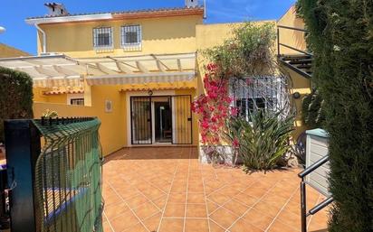 Exterior view of Single-family semi-detached for sale in Dénia  with Air Conditioner and Swimming Pool