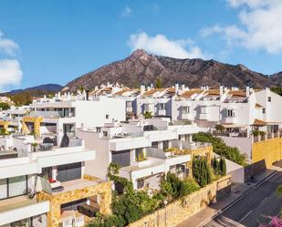 Exterior view of Single-family semi-detached for sale in Marbella  with Air Conditioner, Terrace and Swimming Pool