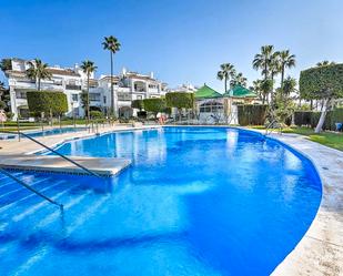 Swimming pool of Apartment for sale in Mijas  with Air Conditioner, Terrace and Furnished