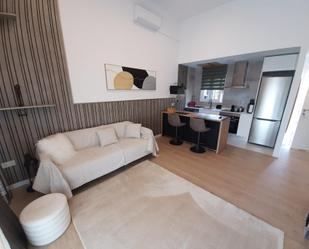 Sala d'estar de Apartament en venda en Benidorm amb Aire condicionat, Jardí privat i Terrassa