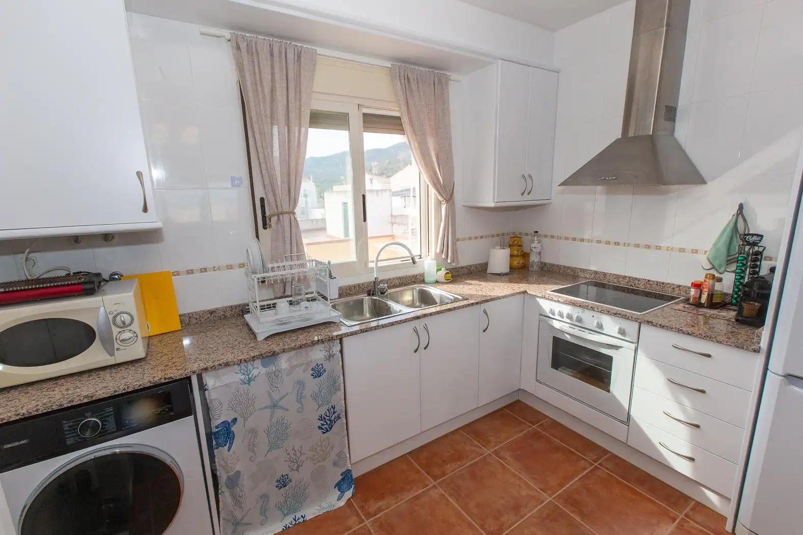 Kitchen of Duplexes for sale in Alcanar  with Terrace and Alarm