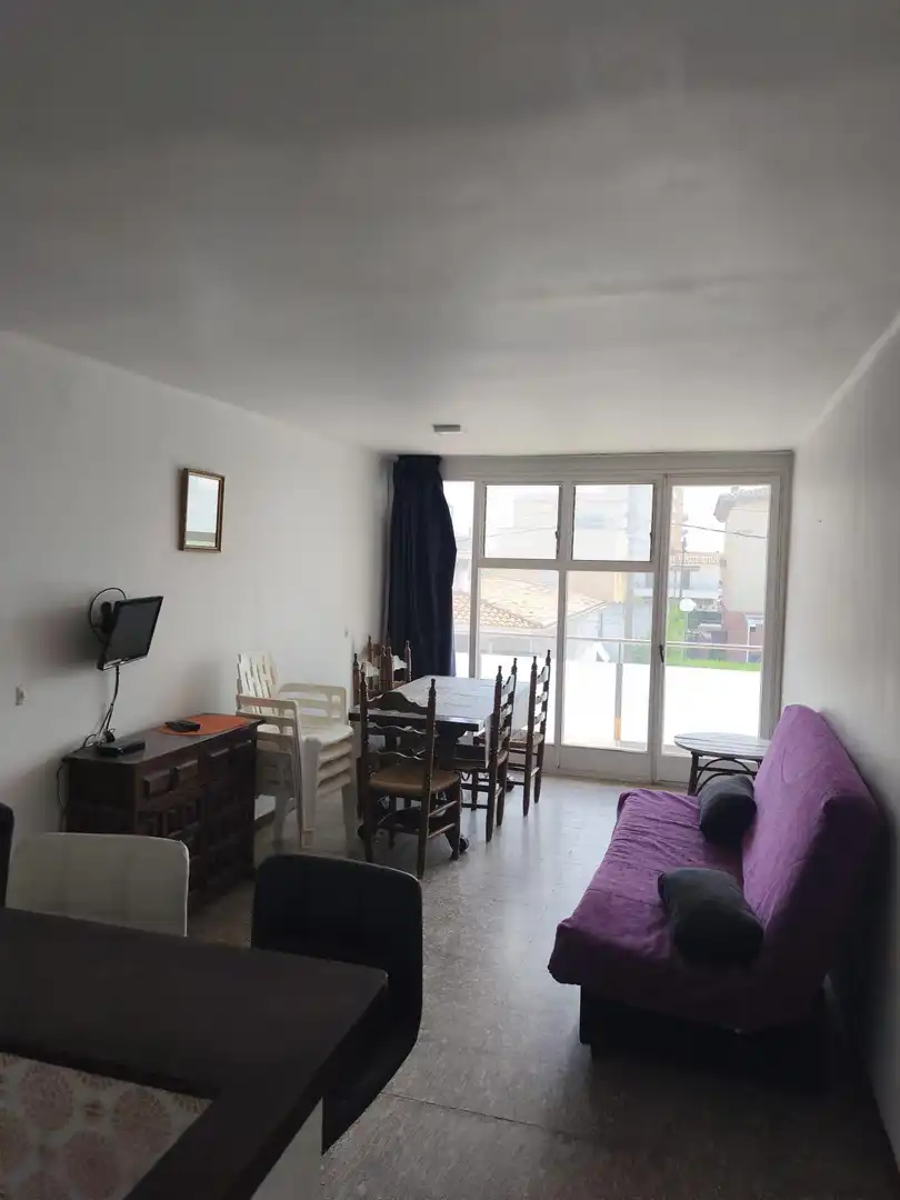 Sala de estar de Piso en venta en L'Estartit con Piscina comunitaria